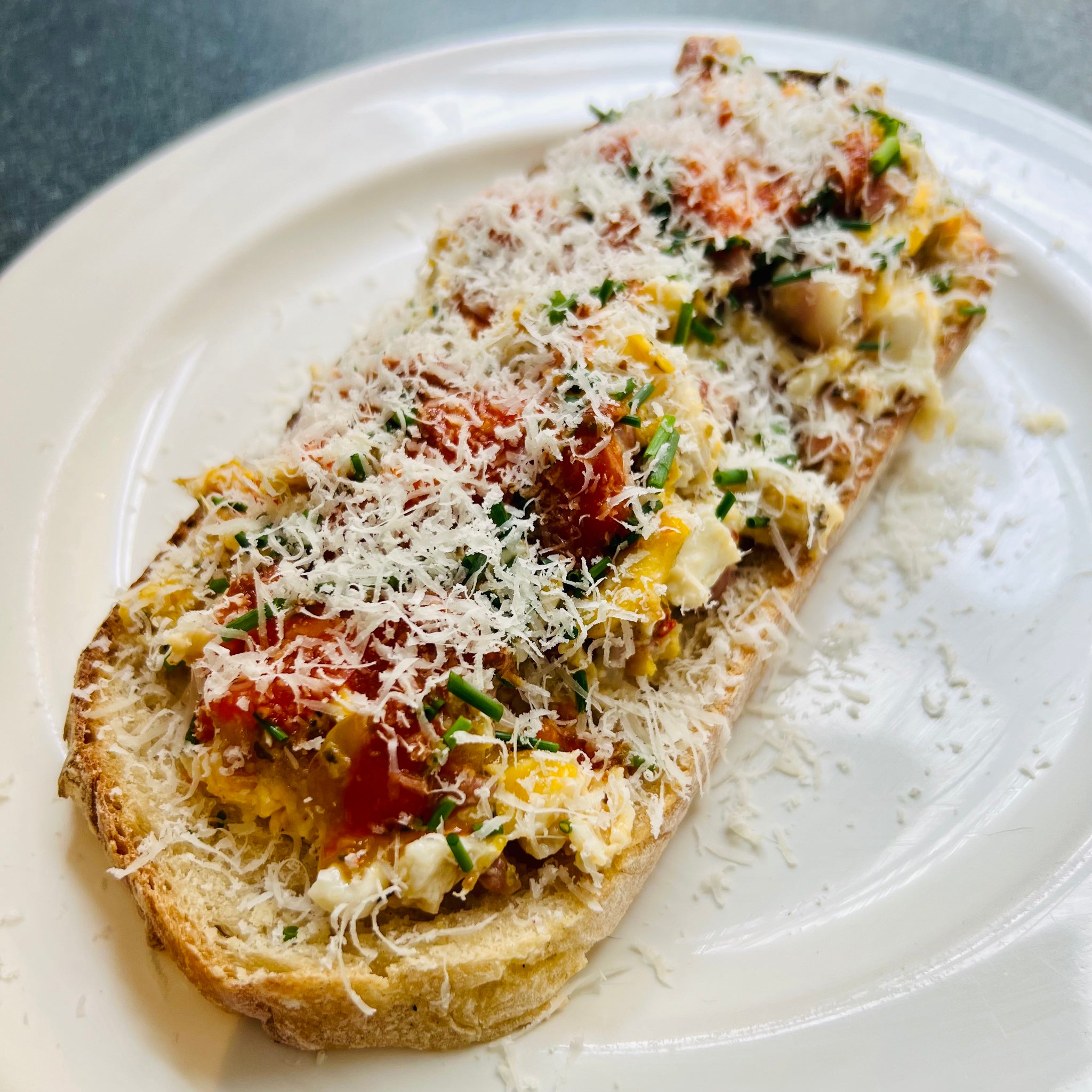 Cheesy Pizza Eggs on Toast